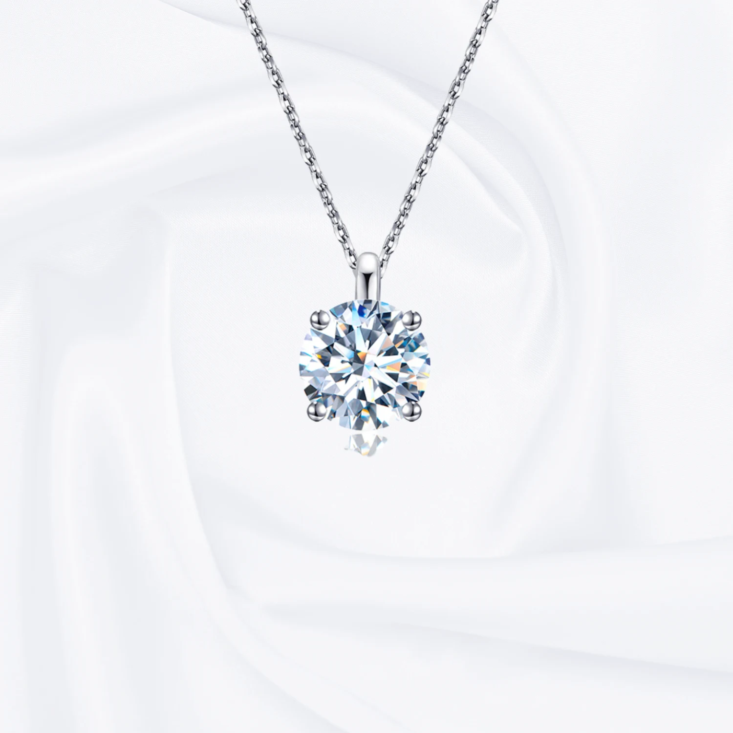 Allison Diamond Drop Necklace by Zomaco on white fabric background - elegant and contemporary design